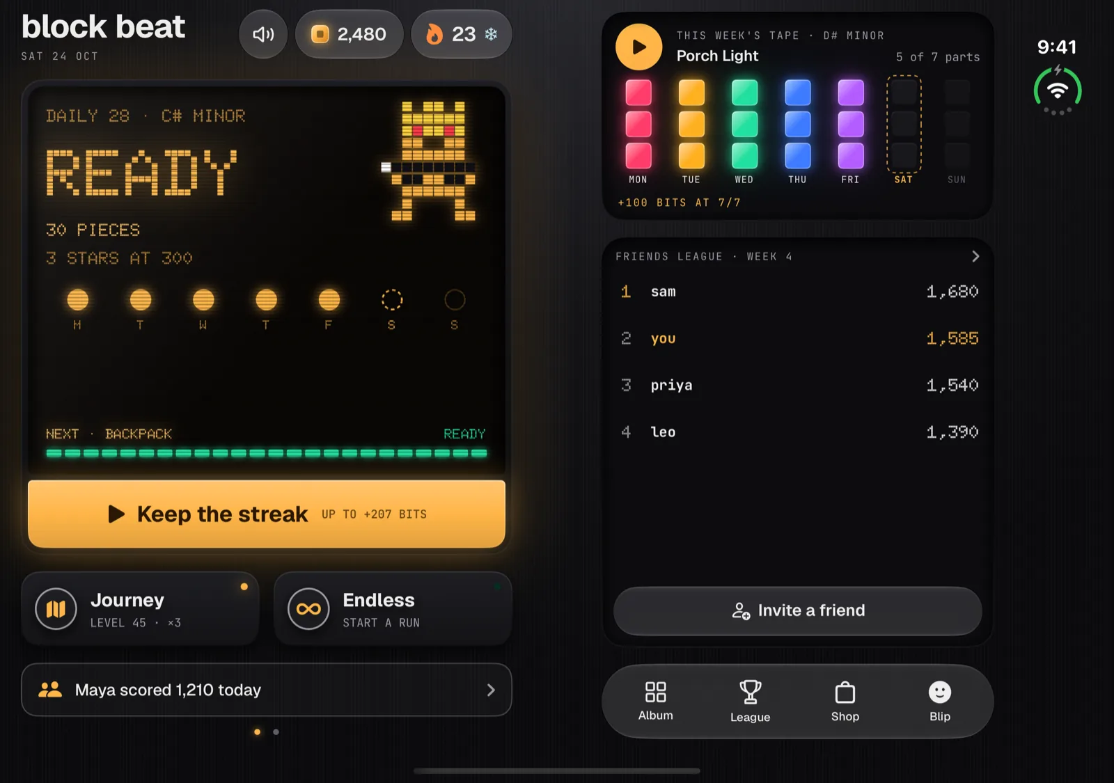 Block Beat on iPhone Duo open display showing the home screen: today's Daily 28 puzzle, the Keep the streak key and the Journey and Endless keys on the left, this week's tape, the friends league and the Album, League, Shop and Blip bar on the right