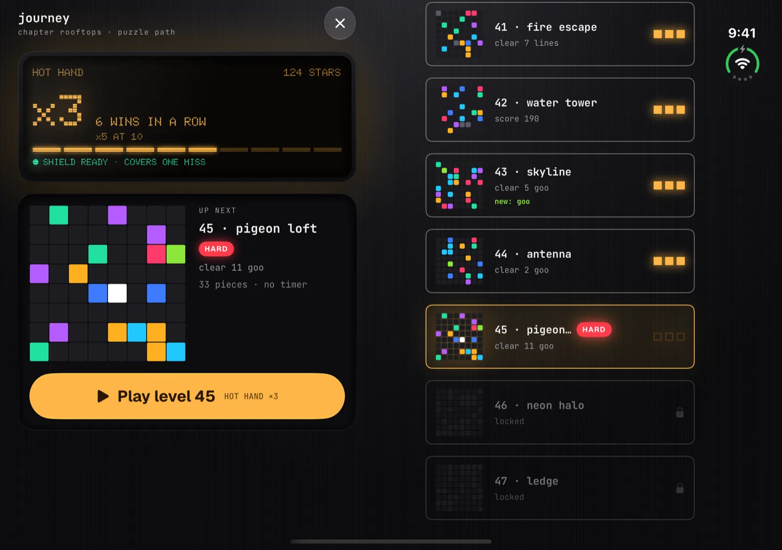 Block Beat on iPhone Duo open display showing the Journey: the Hot Hand screen and a large preview of level 45's board with its goal and Play key on the left, the level path on the right
